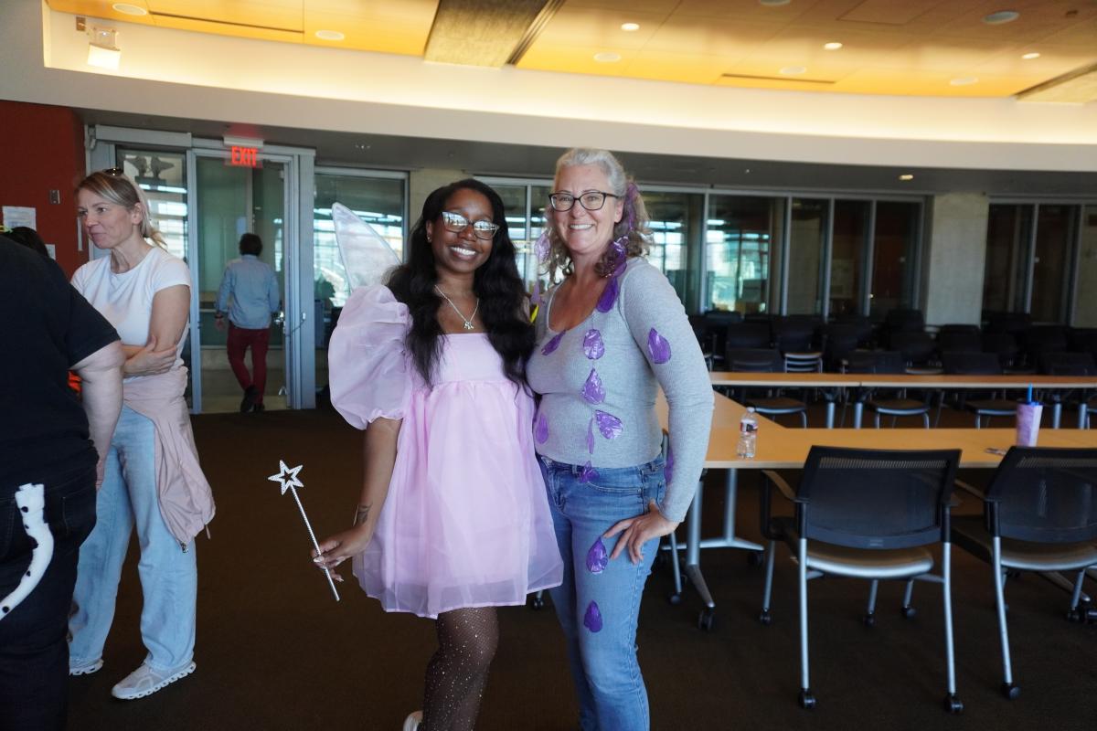 Two of our SE Staff dressed as Tooth Fairy and Purple Rain (Prince)