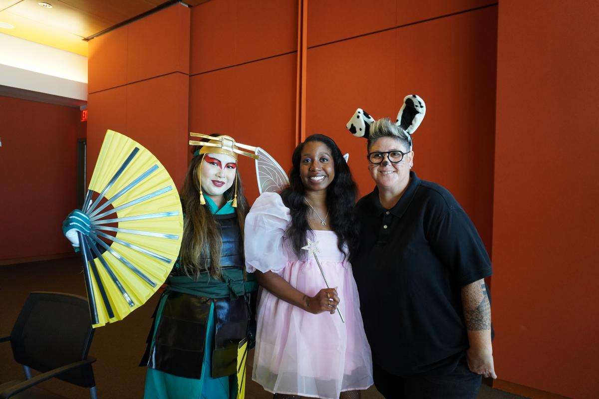 SE Staff dressed as Avatar character, Tooth Fairy, and Dog