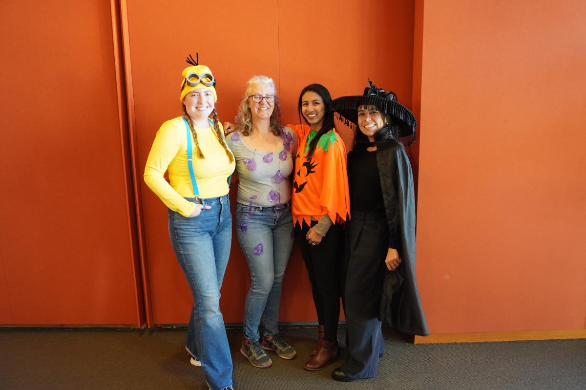 SE Student Affairs Team dressed as (from left to right) Minion, Purple Rain (Prince song), Pumpkin, and Witch