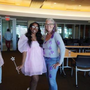 Two of our SE Staff dressed as Tooth Fairy and Purple Rain (Prince)